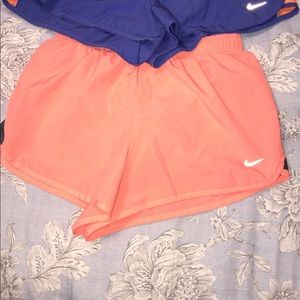 Orange Nike shorts with grey sides